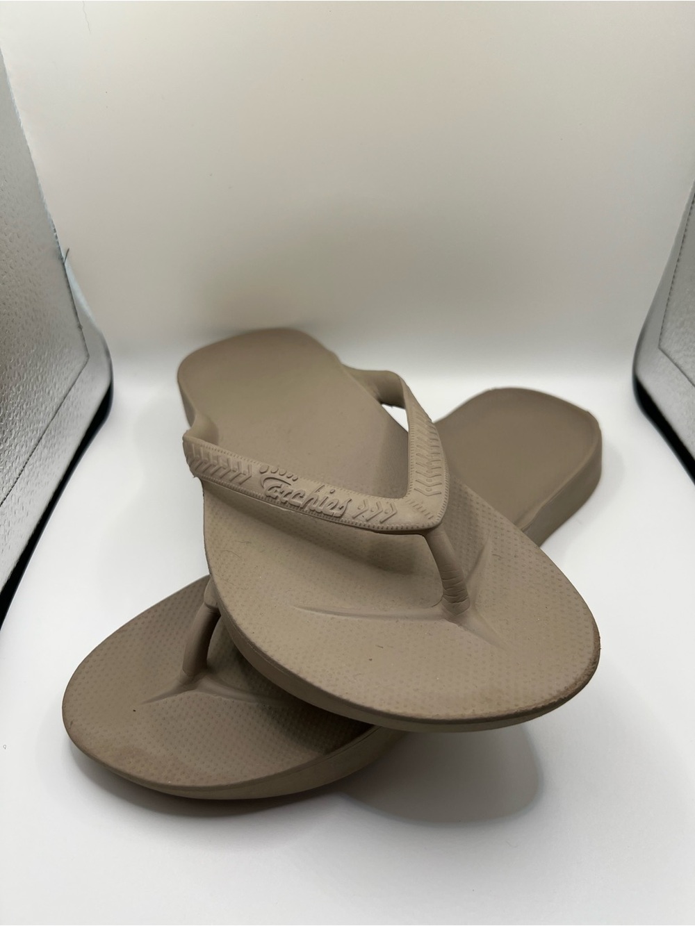 Archie’s flip flops